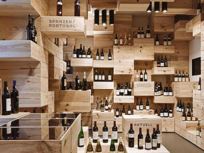 Albert Reichmuth Wine Store, vino e legno si fondono